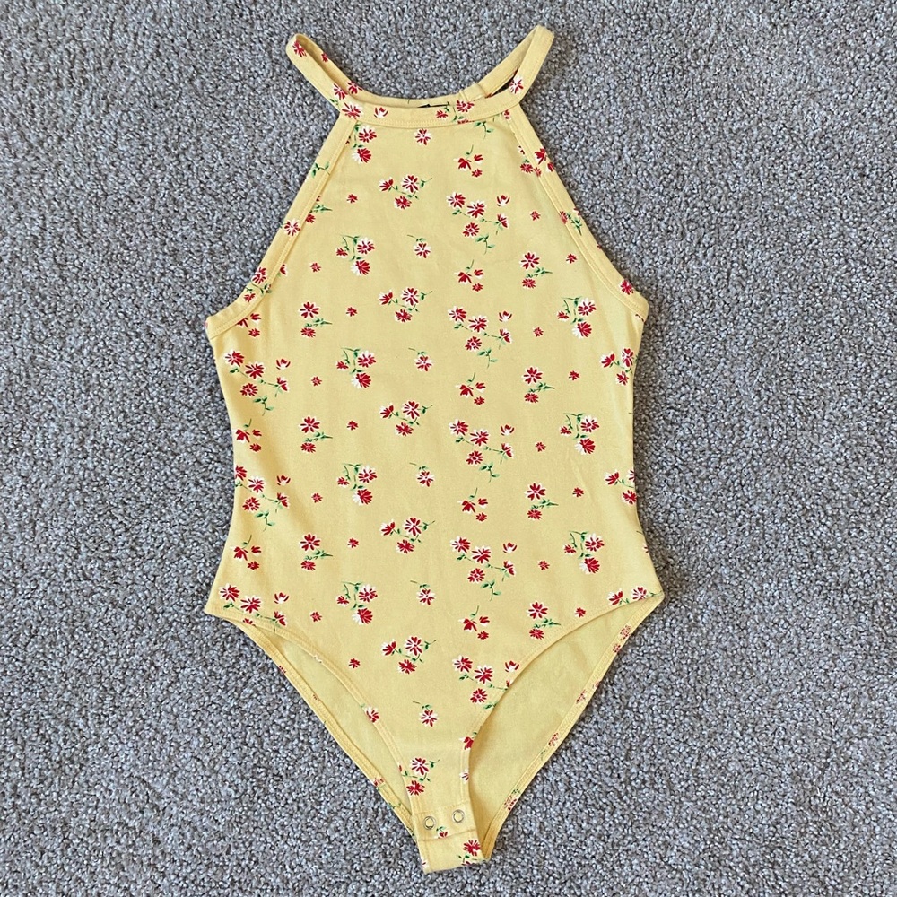 yellow bodysuit